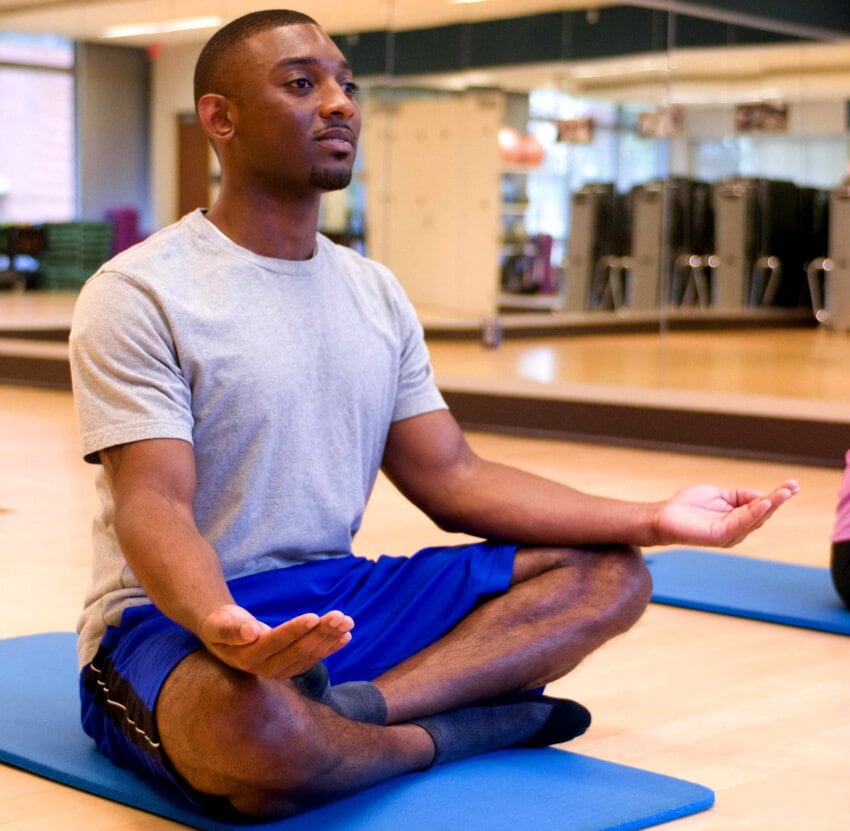 Photo showing a person meditating