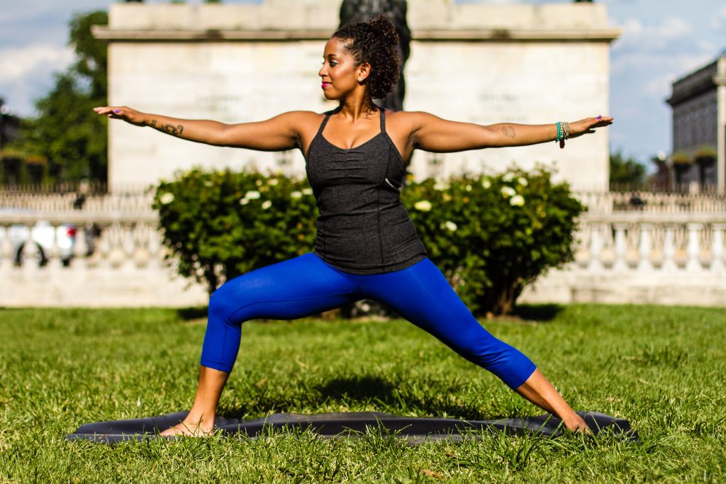 Photo showing a person practicing yoga outside