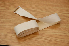 “GaitBelt.jpg” by unknown author is licensed under CC BY 4.0. Access for free at https://opentextbc.ca/clinicalskills/chapter/3-2-body-mechanics/ Image showing a rolled up gait belt